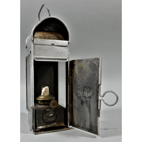 274 - A portable electric signalling lantern, a small silver LNER hand lantern, with burner and another ha... 