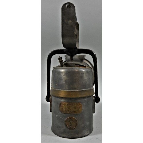 274 - A portable electric signalling lantern, a small silver LNER hand lantern, with burner and another ha... 