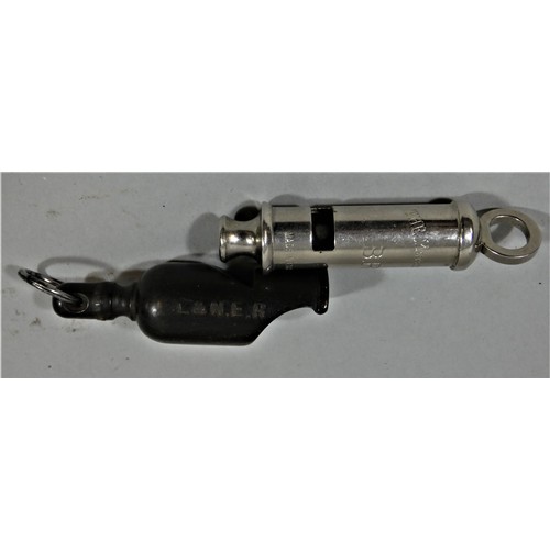 149 - A metal Police whistle and a plastic example (2).