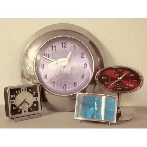 100 - A 1950s/60s manual wind alarm clock, red plastic body with chrome stand & bezel, 8.5 cm tall, togeth... 