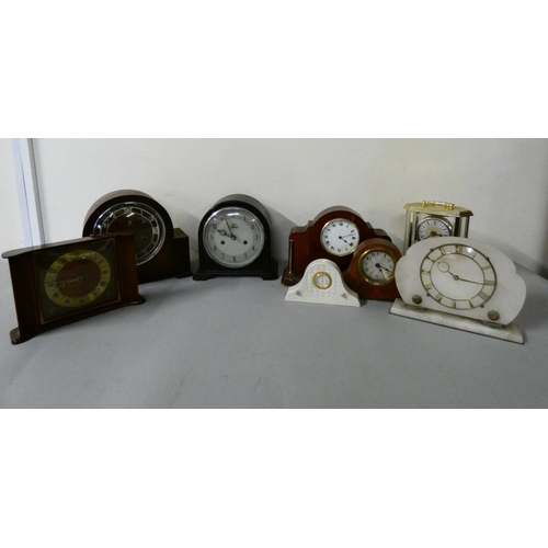 103 - An Edwardian inlaid mohogany mantle clock, with white enameled dial & roman numerals, together with ... 