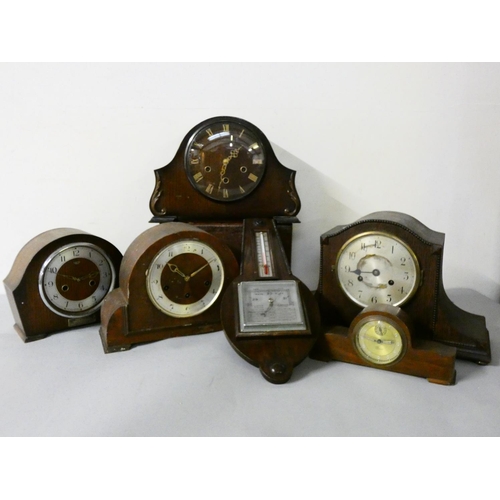 107 - Three oak cased mantle clocks, two mahogany cased mantle clocks, and an oak cased wall barometer.