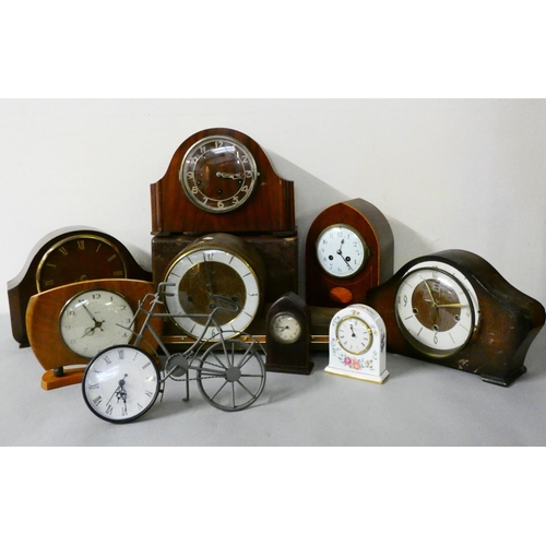 108 - An oak cased 'Napoleon Hat' style mantle clock, together with other oak and mahogany cased mantle cl... 