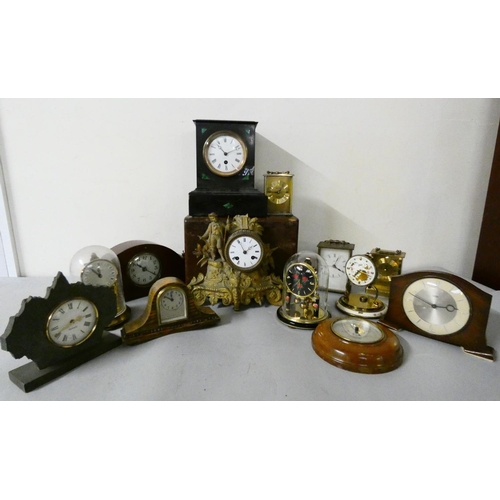 109 - A collection of various mantle clocks including carriage, slate, anniversary, and gilt metal.