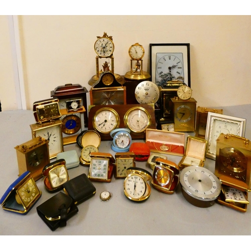 118 - A collection of carriage, alarm, anniversary, and mantle clocks in two boxes (2).