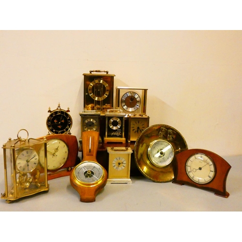 120 - A collection of mantle, carriage, anniversary, and electric clocks and barometers. (3)