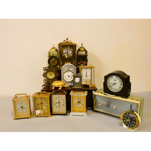 120 - A collection of mantle, carriage, anniversary, and electric clocks and barometers. (3)