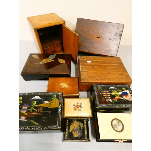 126 - A collection of wooden and lacquered boxes.