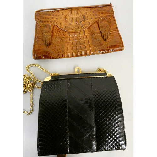 131 - A crocodile handbag, a snakeskin handbag and a collection of handbags and purses.