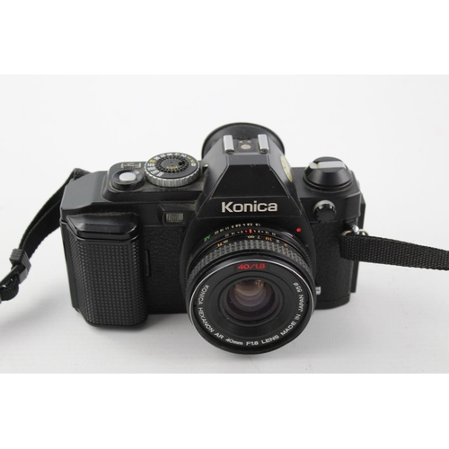 399 - Konica FS-1 SLR Film Camera w/ Konica Hexanon AR 40mm F/1.8 Pancake Lens  The camera is WORKING and ... 