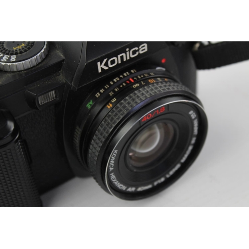 399 - Konica FS-1 SLR Film Camera w/ Konica Hexanon AR 40mm F/1.8 Pancake Lens  The camera is WORKING and ... 