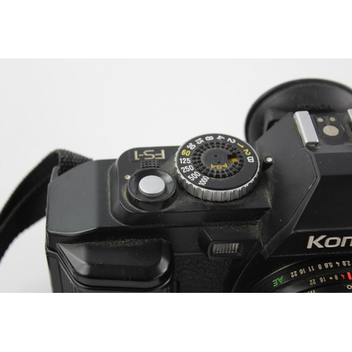 399 - Konica FS-1 SLR Film Camera w/ Konica Hexanon AR 40mm F/1.8 Pancake Lens  The camera is WORKING and ... 