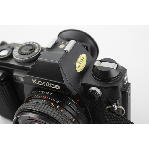 399 - Konica FS-1 SLR Film Camera w/ Konica Hexanon AR 40mm F/1.8 Pancake Lens  The camera is WORKING and ... 