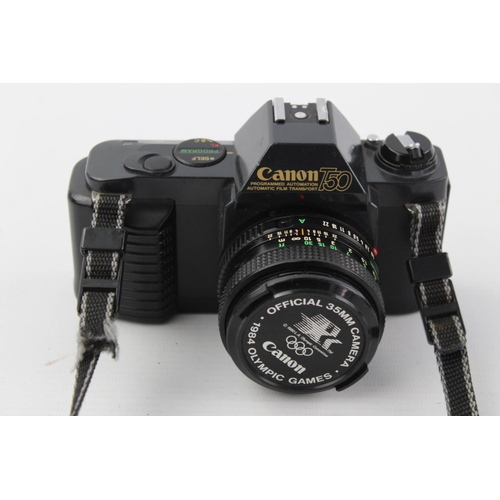 404 - Canon T50 SLR Film Camera w/ Canon FD 50mm F/1.8 Lens  The camera is WORKING and in a vintage condit... 