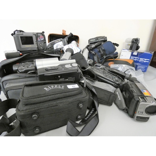 65 - A selection of cased/uncased digital/video camcorders, makers to include Sony, JVC, and a Ricoh XR-X... 