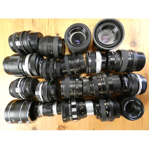 75 - A collection of camera accessories including, Olympus, Nikon, and Canon lenses, flash units, filters... 