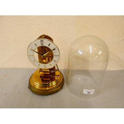 93 - A hexagonal brass cased Kundo mantle clock, together with a Kundo anniversary clock. (2)