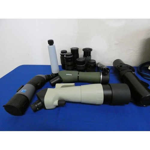 71 - A selection of camera equipment including lenses, monoculars by Nikon. (cased & uncased)