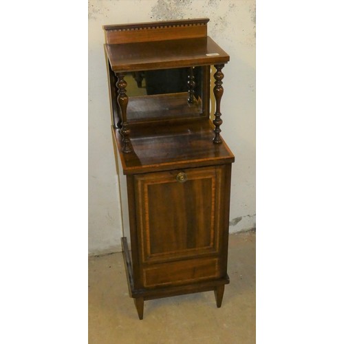 421 - An Edwardian mahogany and boxwood strung coal purdonium, with a raised mirror back beneath an upper ... 