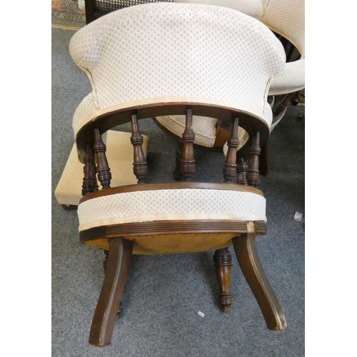 433 - A pair of mahogany framed tub chairs, turned spindle back supporting upholstered arm and upper back ... 