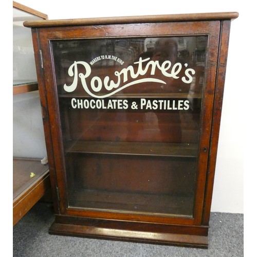 436 - A mahogany glazed cabinet, the glass painted Rowntrees Chocolates and Pastilles, 73 x 25 x 90 cm.