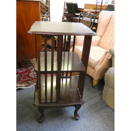 442 - A mahogany revolving library bookcase, raised on cabriole support, 88 cm high.