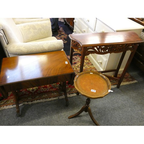 448 - A mahogany side table with peirced freize, a reproduction mahogany Sutherland table and a wine table... 