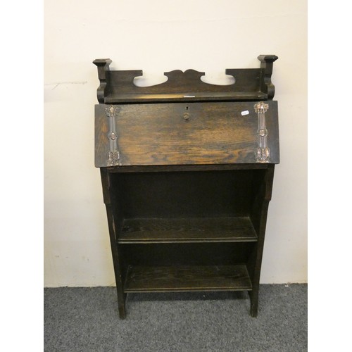 450 - A stained oak Art Nouveau bureau bookcase, the fall front revealing a fitted interior, 62 x 107 cm.