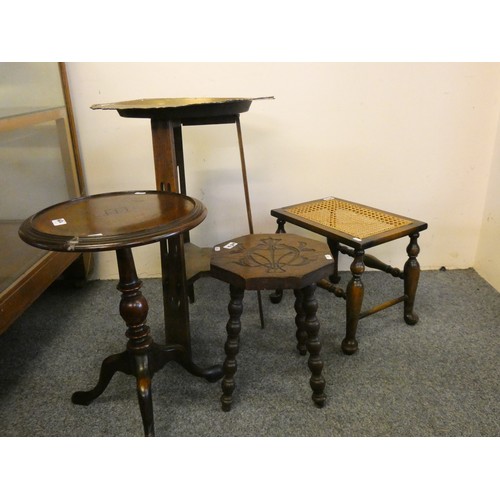 452 - A brass table top raised on an oak frame, two stools and a wine table (4).