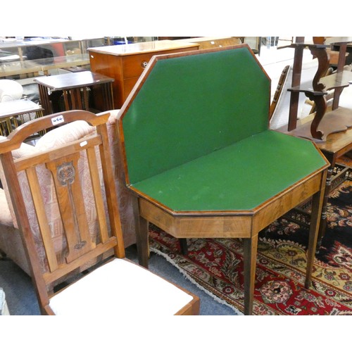 454 - An Edwardian octagonal fold over card table with boxwood inlay, raised on tapering legs, 100 x 50 cl... 