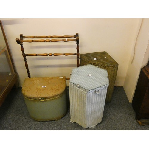 457 - A mahogany towel rail and three Lloyd Loom type washing baskets (4).