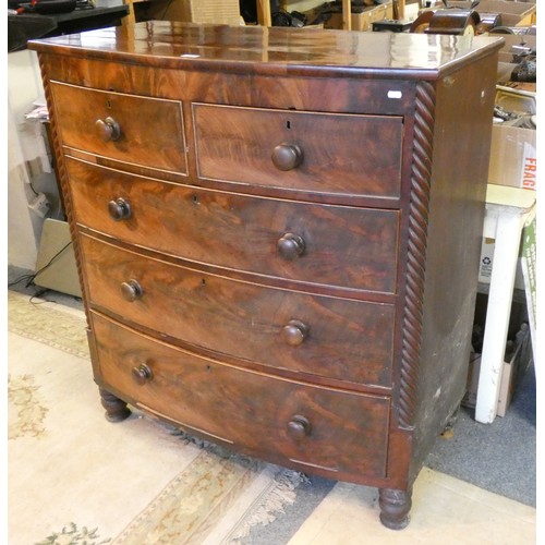 466 - A Victorian bow front chest of two short over three long drawers with spiral turned corners, raised ... 