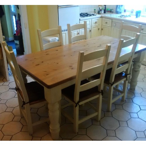 471 - A substantial cream painted pine dining table together with a set of six matching painted pine dinin... 