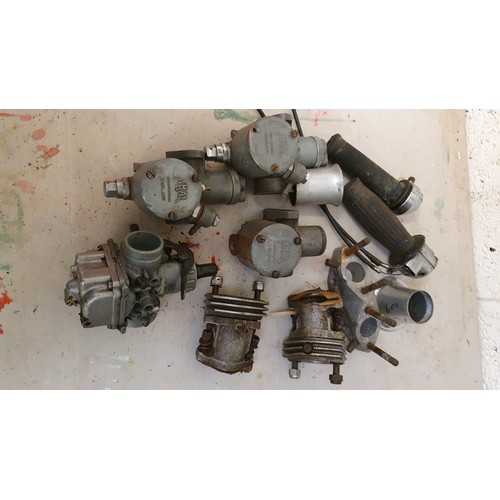 191 - A Mikuni carb, three Amal carbs and other related parts