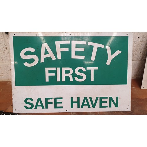 130 - A pair of Cadwell Park, British Superbike plastic signs and an alloy Safty First Save Haven sign, 40... 