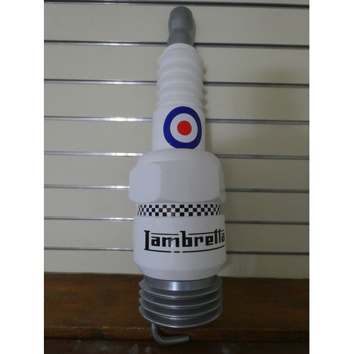 123 - A fibreglass Lambretta spark plug wall mounted advertising sign, 80 cm.