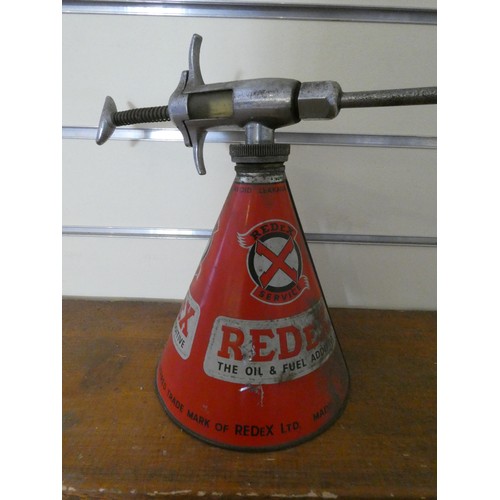 64 - A Redex Fuel Additive dispenser, height 24 cm.