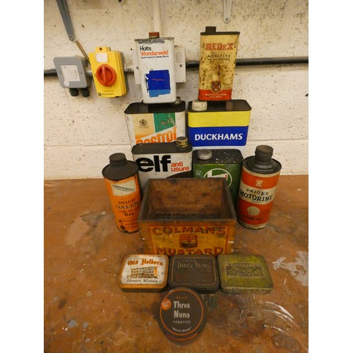 78 - A collection of tins including Lovejoy Shock Absorber Oil.