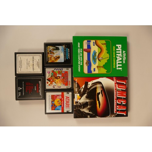 14 - Boxed Atari 2600 complete with power supply, joystick controller, tv lead, owners manual. Including ... 