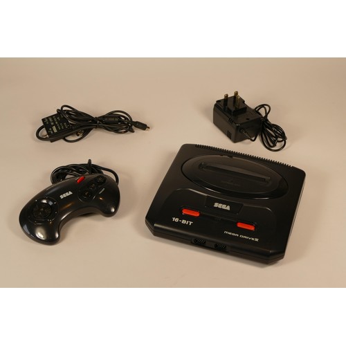 18 - Sega MegaDrive II console with, power supply unit, controller pad, TV lead with RF unit and a select... 