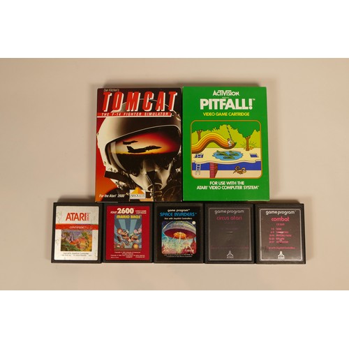 25 - Atari 2600 games console, power supply, joystick, TV lead and a collection of seven games including ... 