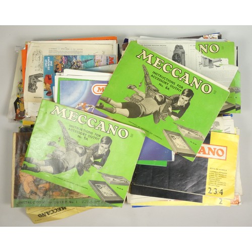 186 - A large quantity of Meccano parts and spares together with a large collection of Meccano instruction... 