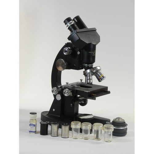 213 - A Cooke, Troughton and Simms binocular microscope patent number 467926 in fitted case, including vil... 