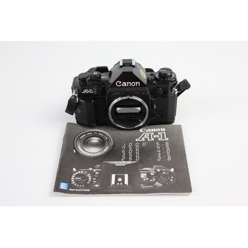 332 - Canon A-1 35mm SLR Film Camera (Body ONLY) All Black Colour-Way w/ Instructions  NOTE: Camera has CA... 