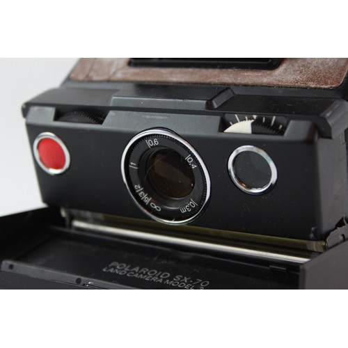 297 - Vintage Polaroid SX-70 Land Camera Brown & Black Model - Vintage Condition  Sold as UNTESTED