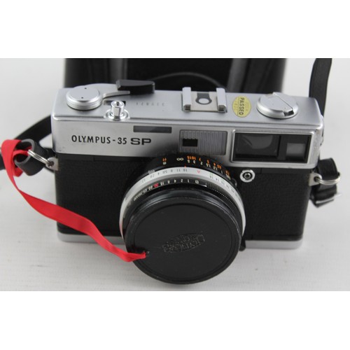 287 - Olympus 35 SP Film Camera w/ 42mm F/1.7 Lens  This camera is WORKING and in a very good condition Wi... 