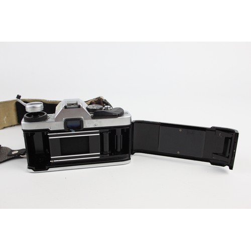 294 - Olympus OM20 SLR Film Camera w/ Olympus OM-System 135mm F/3.5 Lens  The camera is WORKING and in a g... 