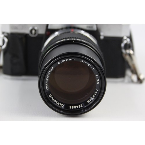 294 - Olympus OM20 SLR Film Camera w/ Olympus OM-System 135mm F/3.5 Lens  The camera is WORKING and in a g... 