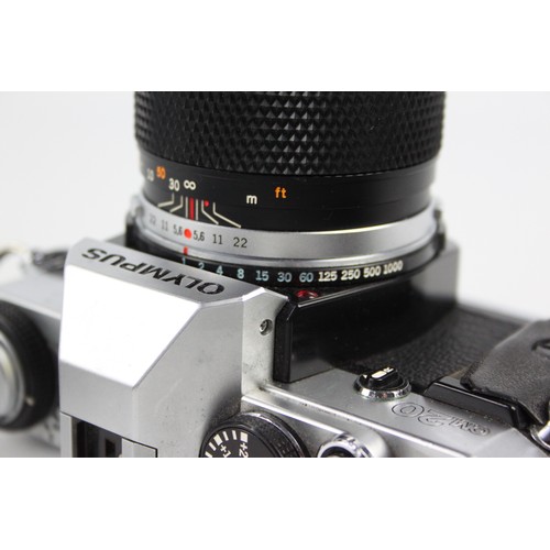 294 - Olympus OM20 SLR Film Camera w/ Olympus OM-System 135mm F/3.5 Lens  The camera is WORKING and in a g... 