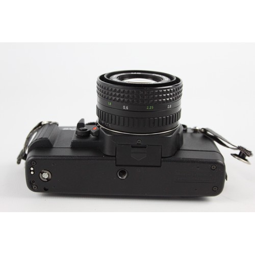 305 - Praktica BX20 SLR Film Camera w/ Pentacon Prakticar 50mm F/1.8 MC Lens  The camera is WORKING and in... 